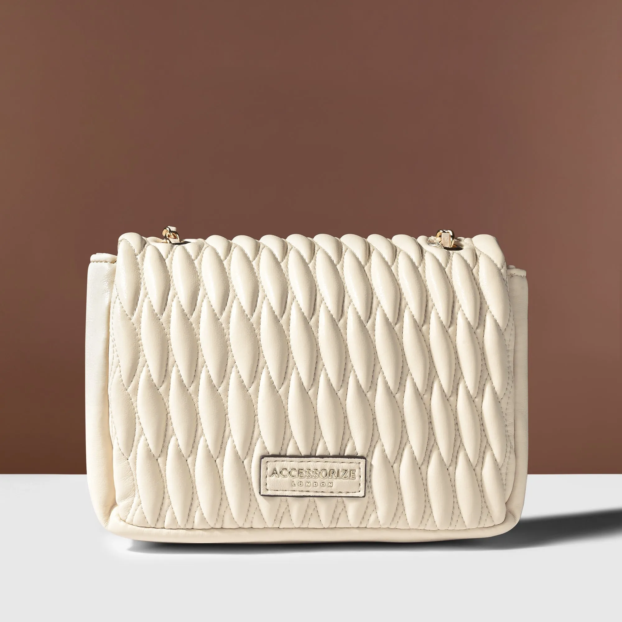 Accessorize London Women's Cream Quilted Sling Bag