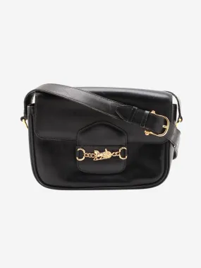 Black flap horse buckle bag